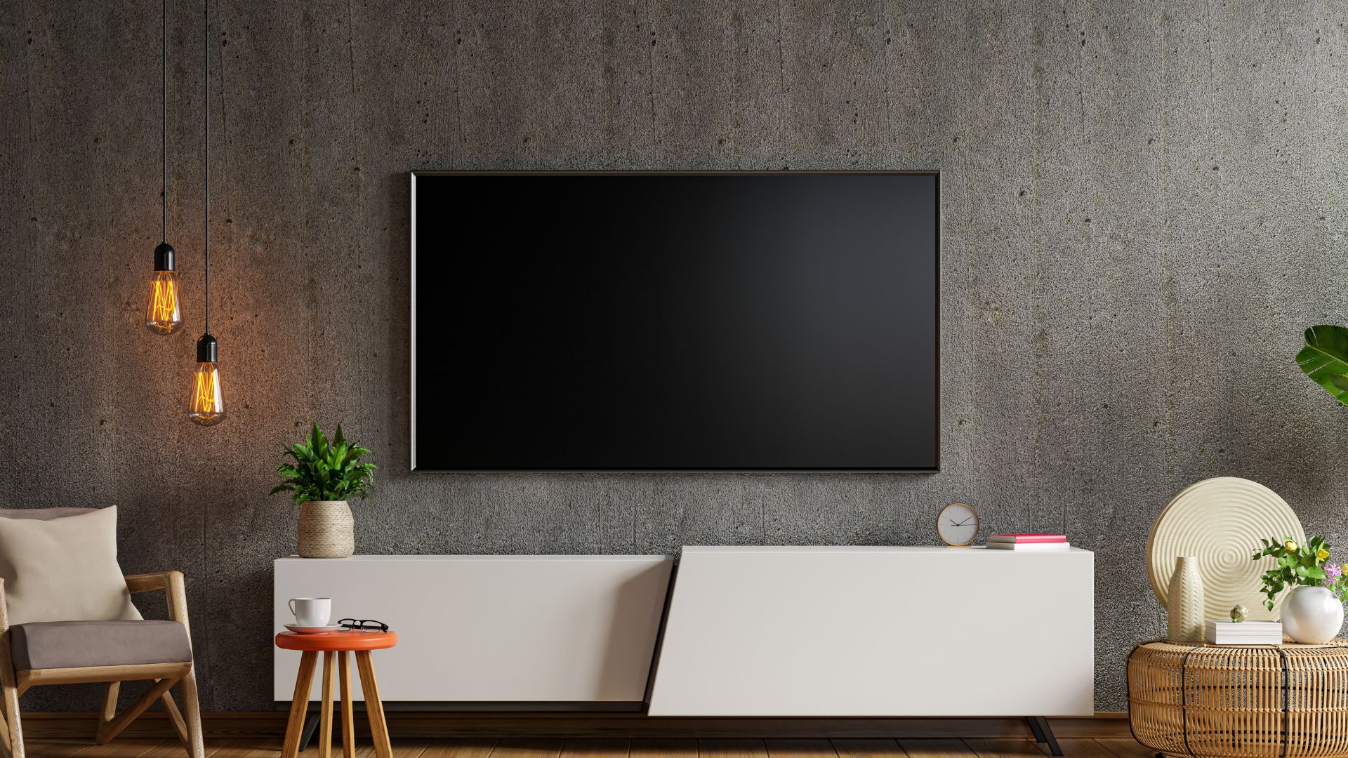 Modern living room with black TV, hanging lights, and minimalist decor
