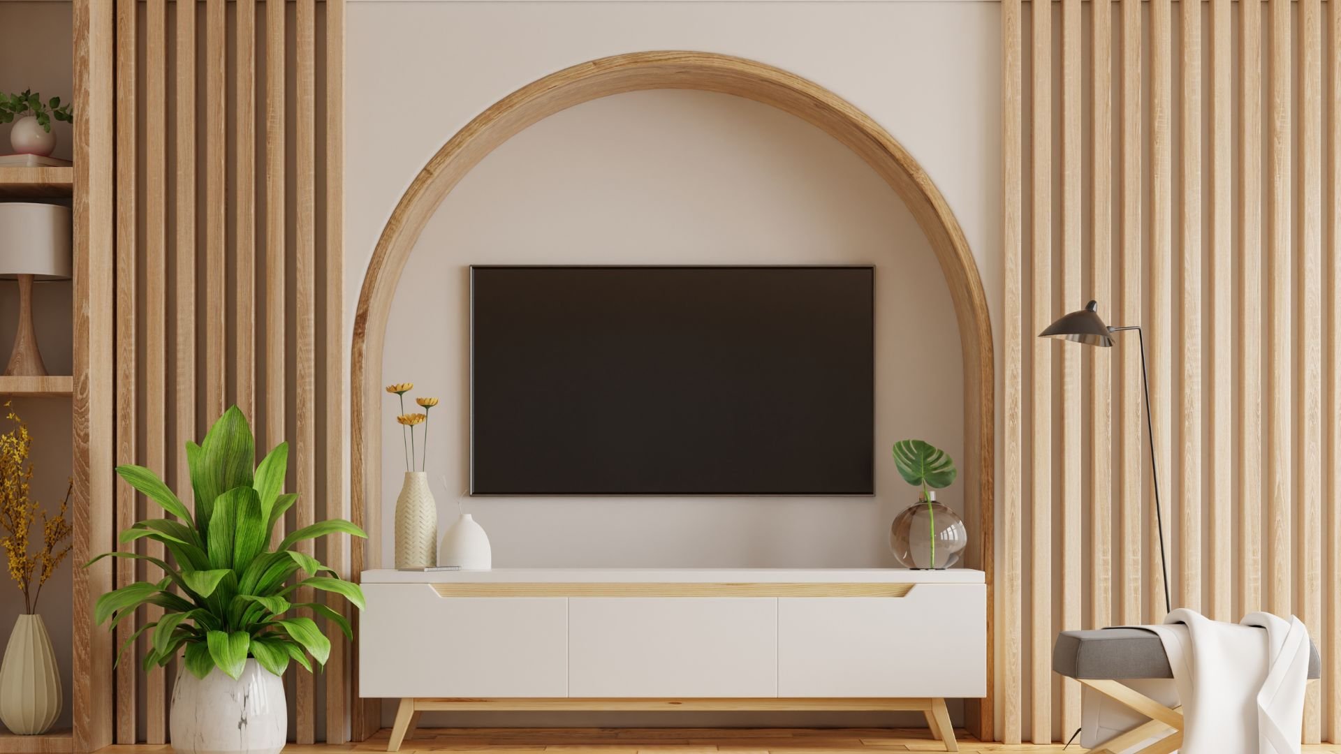 Modern living room with TV, plants, and wooden arch design